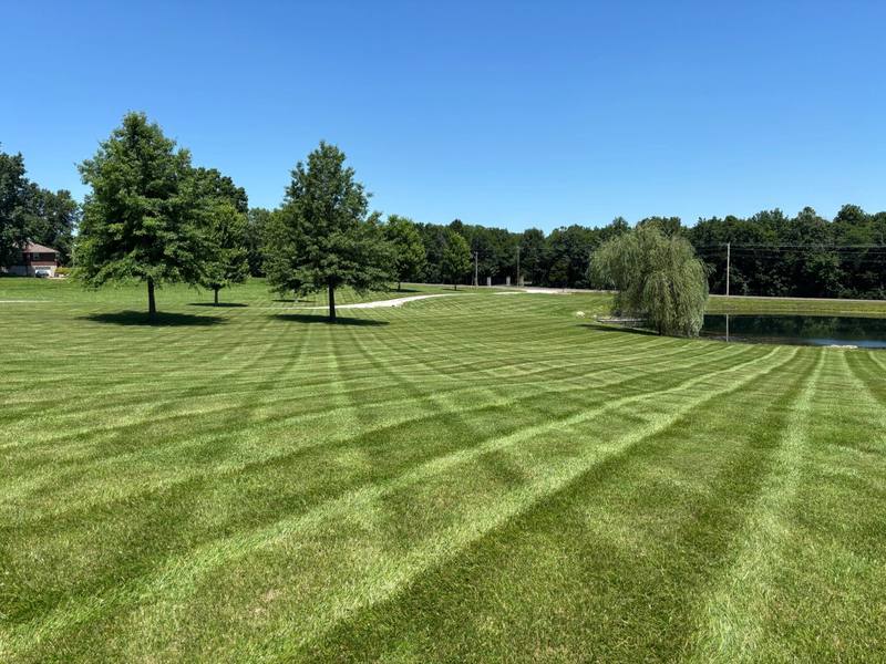 Striped lawn mowed by Stewart's Seasonal Services