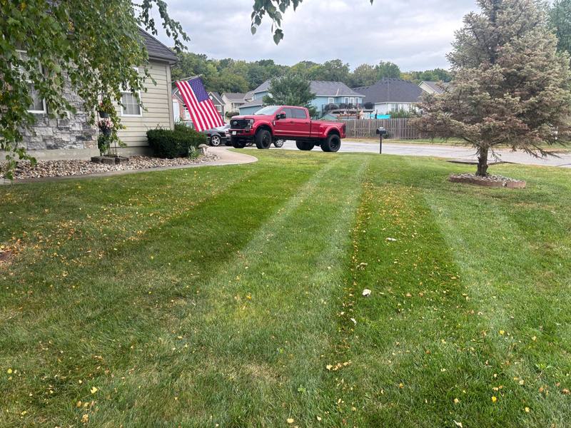 Striped lawn mowed by Stewart's Seasonal Services