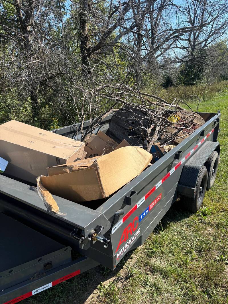 Brush and junk removal job by Stewart's Seasonal Services