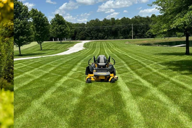 Striped lawn mowed by Stewart's Seasonal Services